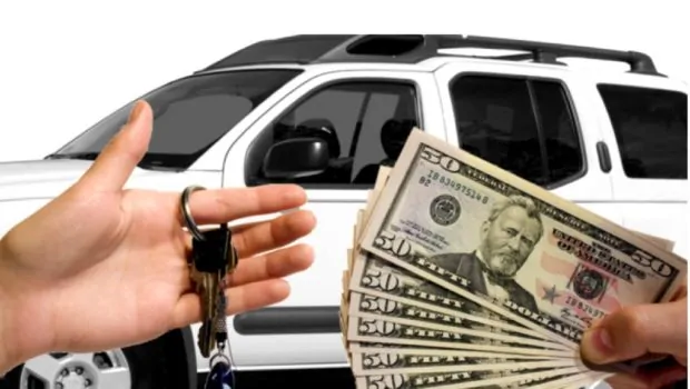 Image of person buying a car with cash